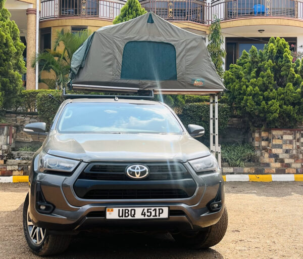 Toyota Hulix Rental with a rooftop tent